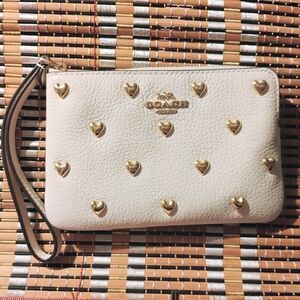 Coach Corner Wristlet In Cream Color with Gold Heart Accented Rivets